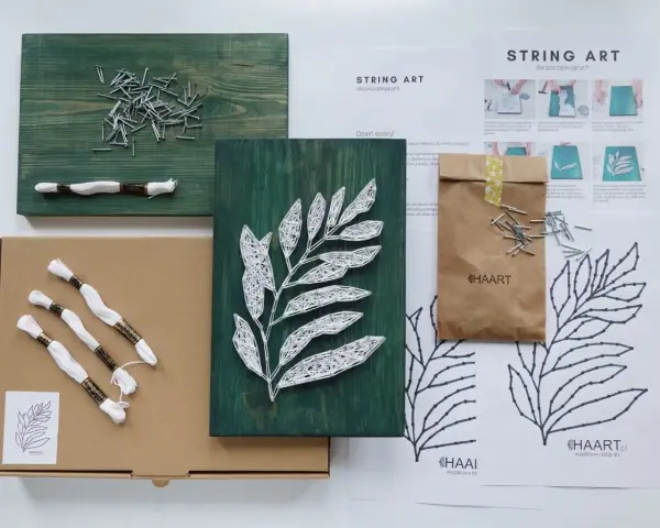Zestaw do tworzenia string art z szablonami dla początkujących. Drewniana deska, gwoździe, biała nić i instrukcje.