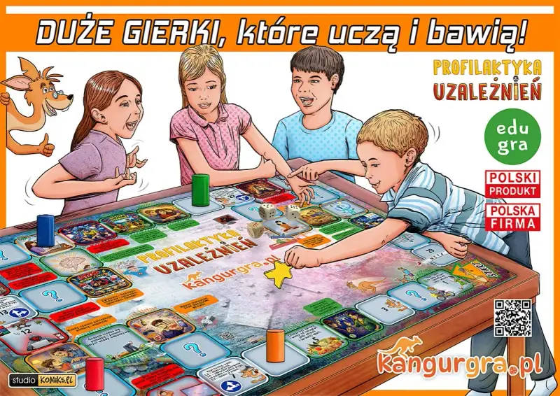 Dzieci grają w planszówkę o profilaktyce uzależnień. To jedna z tych gry o Polsce, które uczą i bawią.